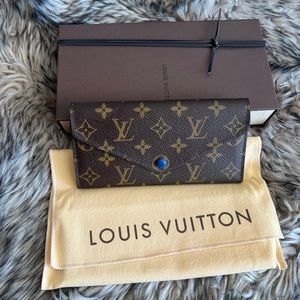 Sarah Louis Vuitton wallet.